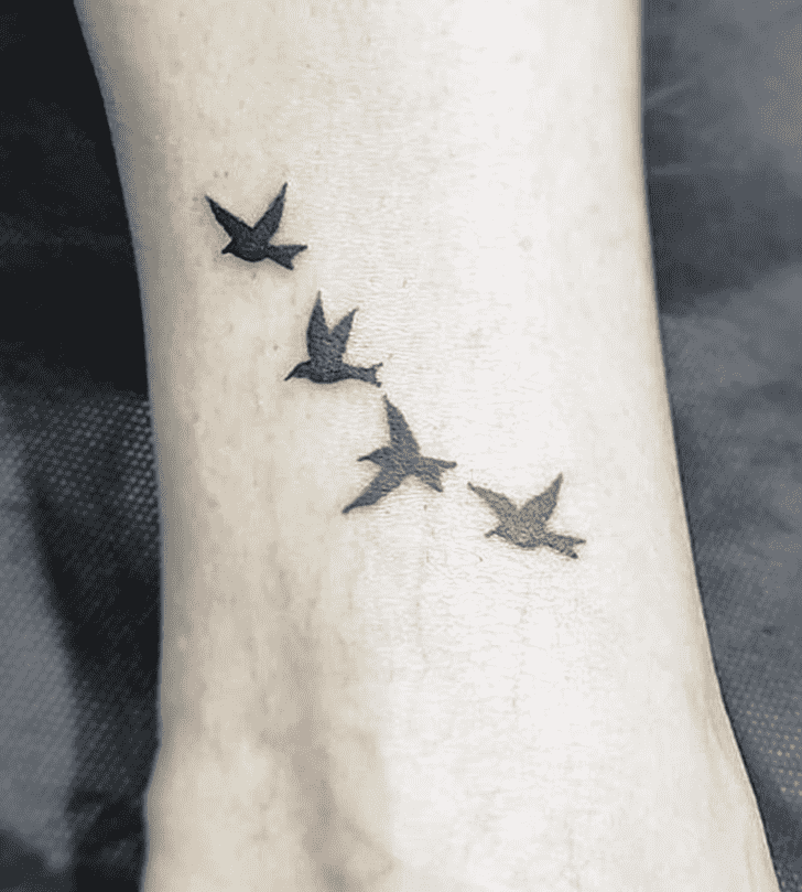 Small Bird Tattoo Photo
